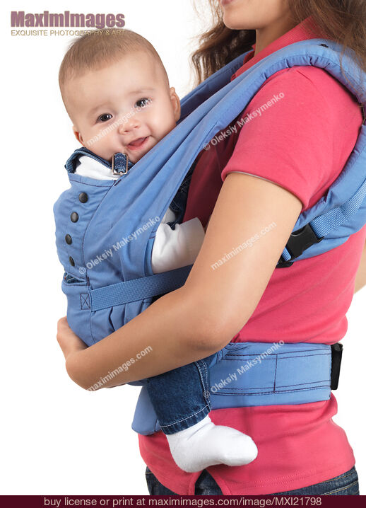 Mother with a Baby in a Carrier. Stock Photo MXI21798