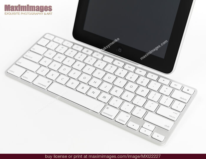 Stock photo of Apple iPad 3G Tablet with a Keyboard Buy commercial use license at MaximImages