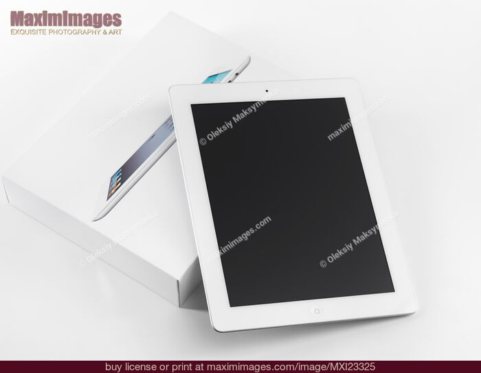 Stock photo of Apple iPad 2 out of the Box Buy commercial use license at MaximImages