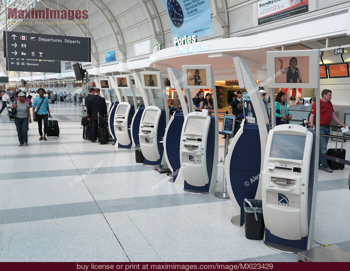 Stock photo of Air Canada Electronic Check-in Kiosks at Airport Buy commercial use license at MaximImages