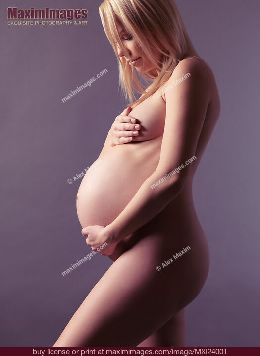 Stock photo of Beautiful nude pregnant woman studio portrait Buy commercial use license at MaximImages