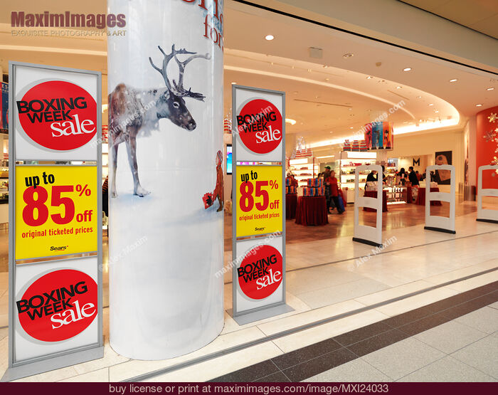Stock photo of Boxing week sale signs in a store Buy commercial use license at MaximImages