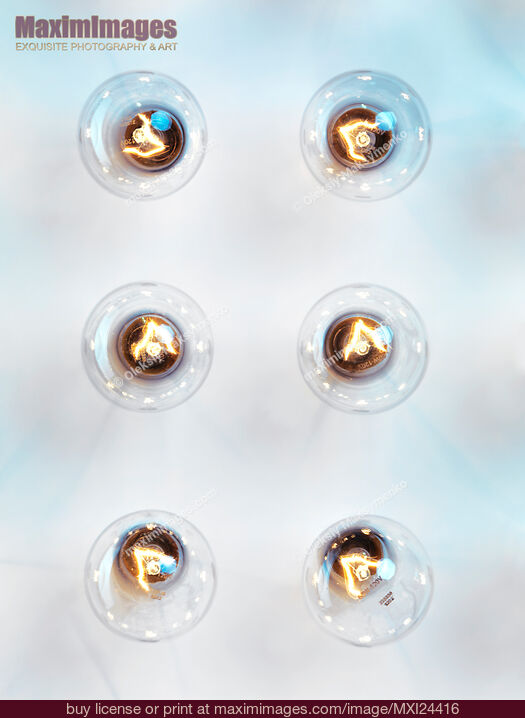 Stock photo of Six lit Incandescent light bulbs Buy commercial use license at MaximImages
