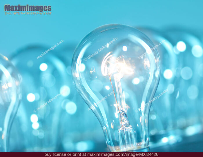Stock photo of Lit up incandescent light bulb Buy commercial use license at MaximImages