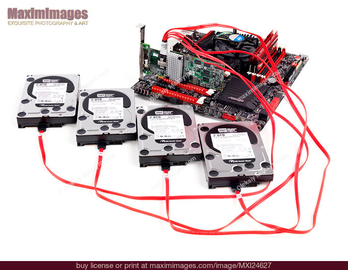 Stock photo of Hard drives connected to motherboard with RAID controller Buy commercial use license at MaximImages