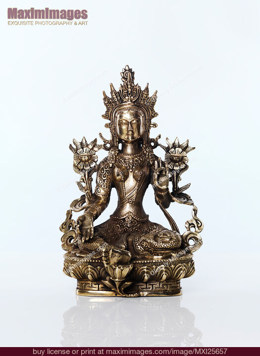 Stock photo of Green Tara goddess statue Buy commercial use license at MaximImages