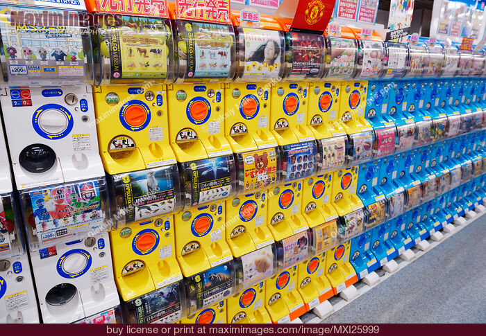 Stock photo of Capsule station machines with anime action figures Buy commercial use license at MaximImages