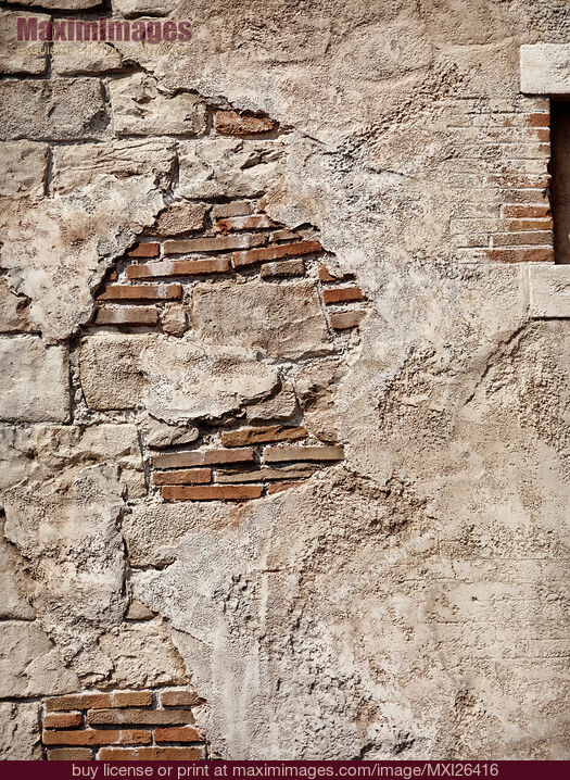 Stock photo of Old rustic stone and brick wall texture Buy commercial use license at MaximImages
