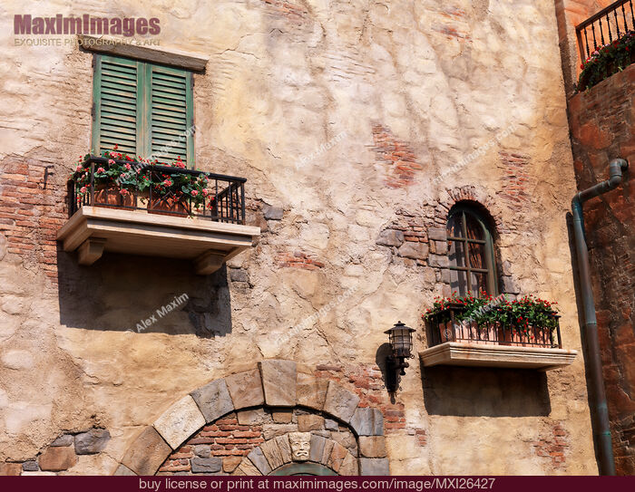 Stock photo of Windows of an old rustic house Buy commercial use license at MaximImages