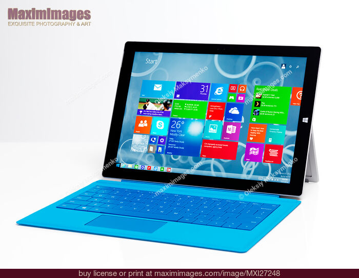 Stock photo of Microsoft Surface Pro 3 tablet with blue keyboard Buy commercial use license at MaximImages