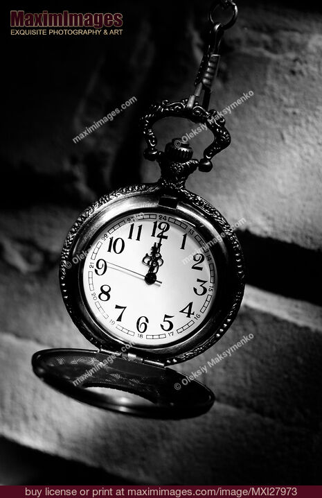 Stock photo of Antique Pocket Watch Showing Twelve Buy commercial use license at MaximImages