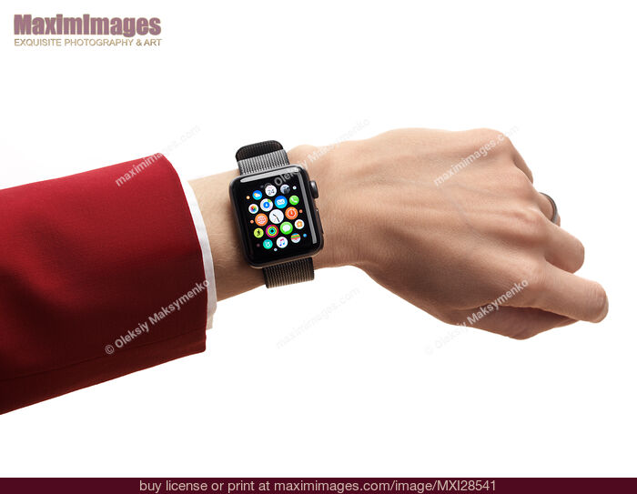 Woman hand with Apple Watch displaying app icons. Stock Photo MXI28541