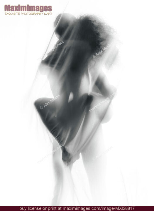 Stock photo of Sensual nude couple making love in glowing white mist Buy commercial use license at MaximImages