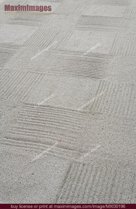 Stock photo of Abstract detail of the design on white gravel of a Japanese Zen garden Buy commercial use license at MaximImages