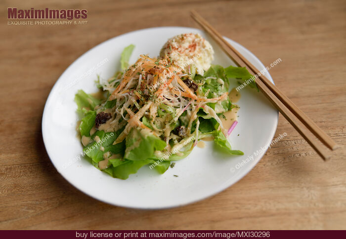 Stock photo of Vegetable salad in a vegan restaurant Buy commercial use license at MaximImages