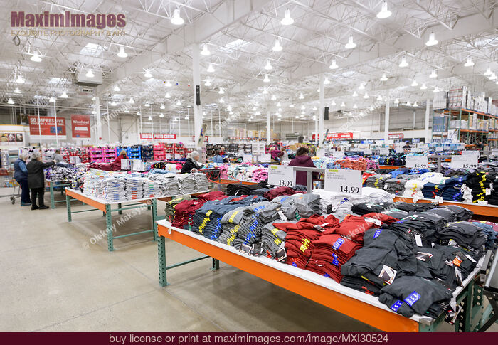 Stock photo of Costco Wholesale warehouse store interior clothing section Buy commercial use license at MaximImages