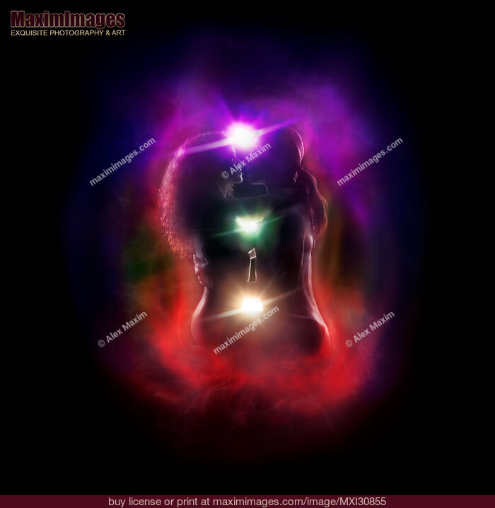 Stock photo of Tantra and Tantric sexuality spiritual concept of a couple making love showing chakral energy flow around their bodies Buy commercial use license at MaximImages
