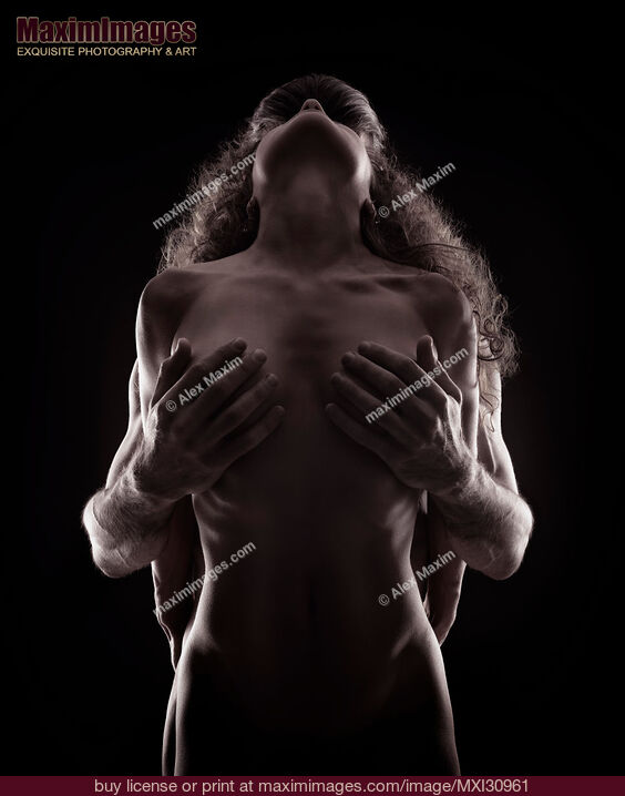 Stock photo of Fine art nude portrait of a couple making love Tantric sexuality concept Buy commercial use license at MaximImages