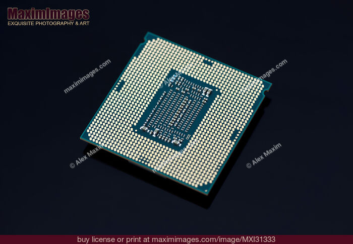 Stock photo of Intel Core i7-8700K processor CPU LGA 1151 socket contacts Buy commercial use license at MaximImages