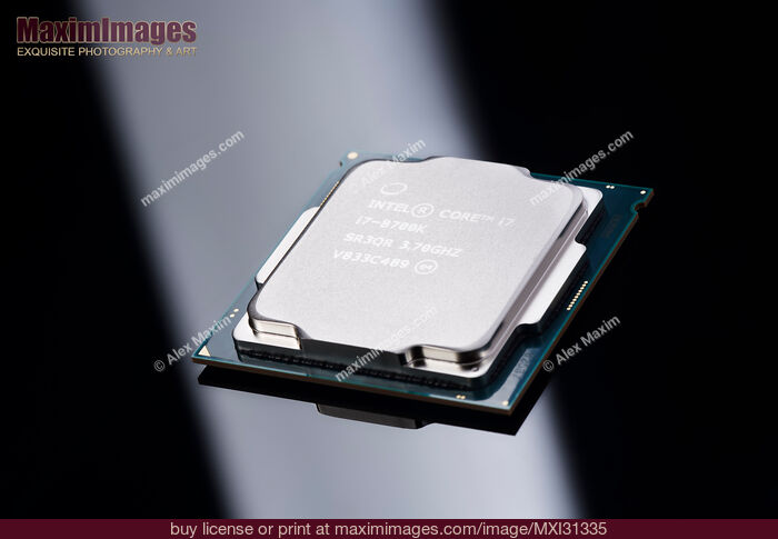 Stock photo of Intel Core i7 8700K processor CPU on black background Buy commercial use license at MaximImages