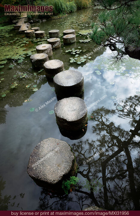 Stock photo of Stepping stones across a pond in Heian-Jingu Shrine gardens. Japanese Zen garden scenery. Heian Jingu Shinto shrine in Sakyo-ku, Kyoto, Japan Buy commercial use license at MaximImages