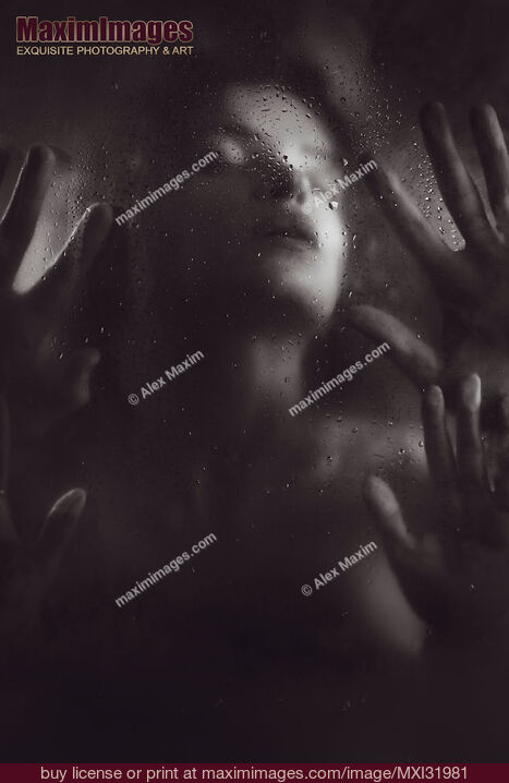 Stock photo of Sensual couple making love behind wet shower glass black and white Buy commercial use license at MaximImages