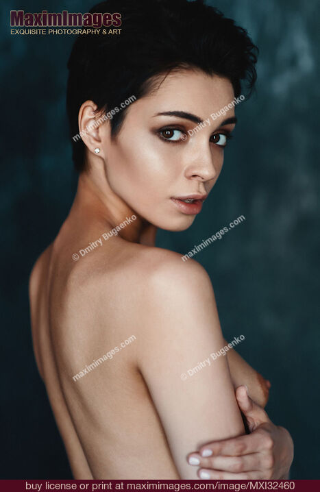 Stock photo of Portrait of a sexy topless woman with short dark hair and an expressive look Buy commercial use license at MaximImages
