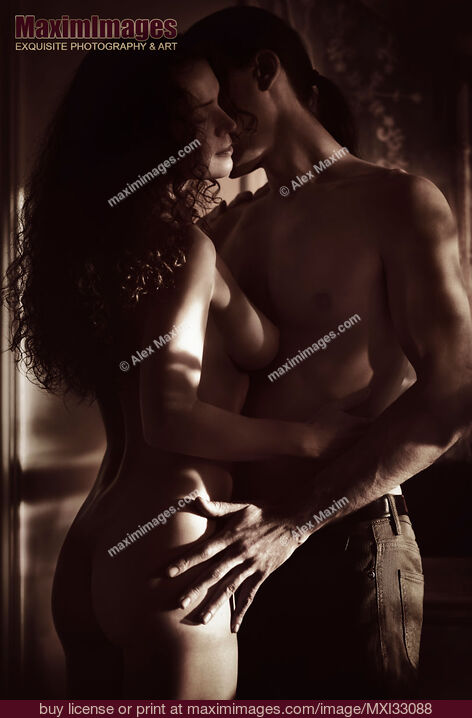 Stock photo of Romantic sensual art nude portrait of a nude woman and a man embracing Black and white Buy commercial use license at MaximImages