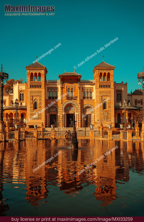 Stock photo of Maria Luisa Park with historic buildings by a pond in Seville Spain Buy commercial use license at MaximImages