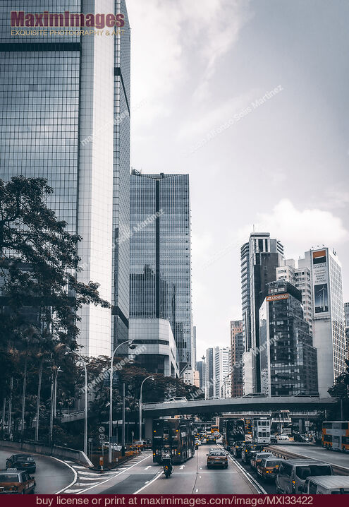Stock photo of Modern architecture high-rise office buildings on streets of Hong Kong China Buy commercial use license at MaximImages