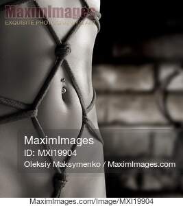 Woman Stomach with Artistic Rope Bondage Shibari... preview image