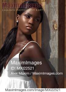 Young Woman in White Dress... preview image