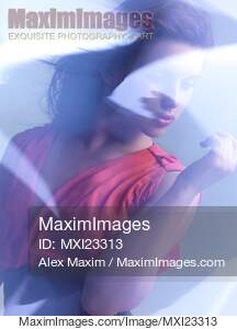 Beauty Photo of a Woman with Shining Blue Reflections... preview image