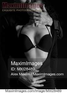 Beautiful sensual portrait of a couple. Man hands...... preview image