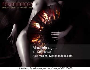 Beautiful naked woman body covered with oriental red fan...... preview image