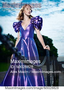 Artistic fashion portrait of woman in beautiful long blue...... preview image