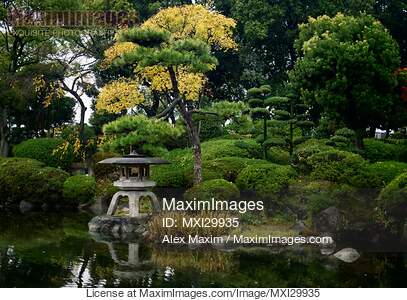 Little Japanese Zen garden with lantern and pond in Osaka Castle Park... preview image