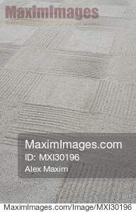 Abstract detail of the design on white gravel of a Japanese Zen garden... preview image