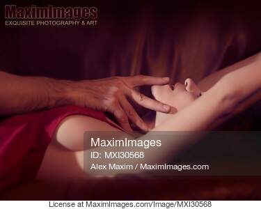 Artistic sensual couple closeup man hand touching woman lips... preview image