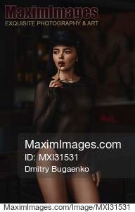 Sensual portrait of a woman in sexy black nylon bodystocking... preview image