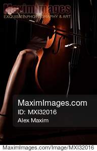 Sensual closeup of a woman hand with a bow passionately...... preview image