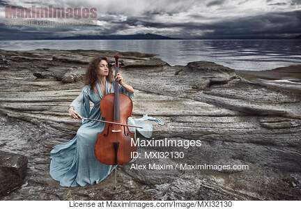Woman with a tranquil thoughtful expression gracefully...... preview image