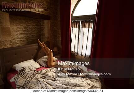 Artistic sensual portrait of a sexy nude woman lying on a...... preview image