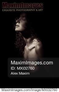 Sensual portrait of a woman face and bare chest closeup in...... preview image