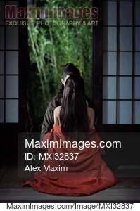 Romantic Asian couple in traditional clothes making love in...... preview image