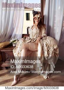 Beautiful Venetian lady courtesan in a carnival mask...... preview image