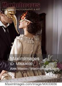 Sensual portrait of a couple in vintage Venetian carnival...... preview image