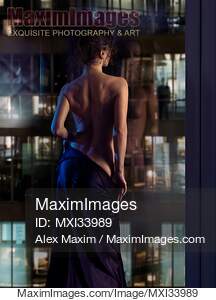 Beautiful sexy woman in undressing in front of a window...... preview image