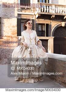 Beautiful smiling lady in vintage Italian carnival costume...... preview image