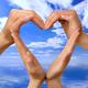 Hands Making Heart Symbol over Blue Sky... (thumbnail)